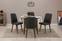 Uitbreidbare ronde eettafelset en 4 stoelen Malva donker hout en antraciet stof.