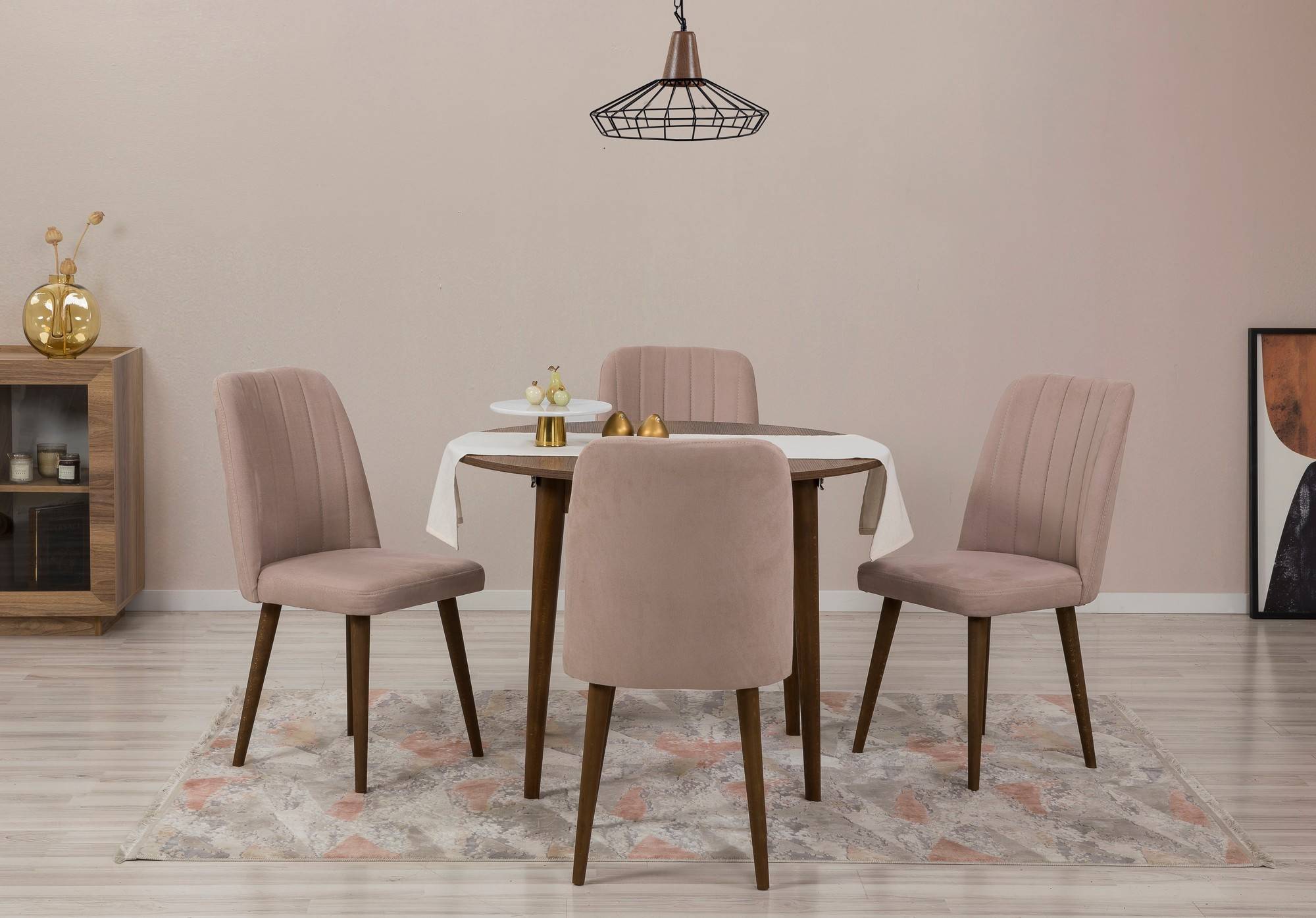 Set tafel met uitbreidbaar ronde tafelblad en 4 Malva stoelen, donker hout en taupe stof.