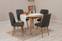 Ensemble table ronde extensible et 4 chaises Malva en bois clair et tissu anthracite.