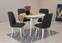 Uitbreidbare ronde tafelset en 4 stoelen Malva, wit hout en antracietkleurige stof.