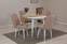 Set tafel met verlengbaar rond tafelblad en 4 Malva wit houten stoelen en taupe stoffen bekleding.