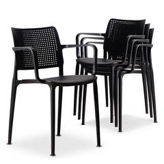 Juego de 4 sillas apilables Hollyne con asiento y respaldo perforados Negro