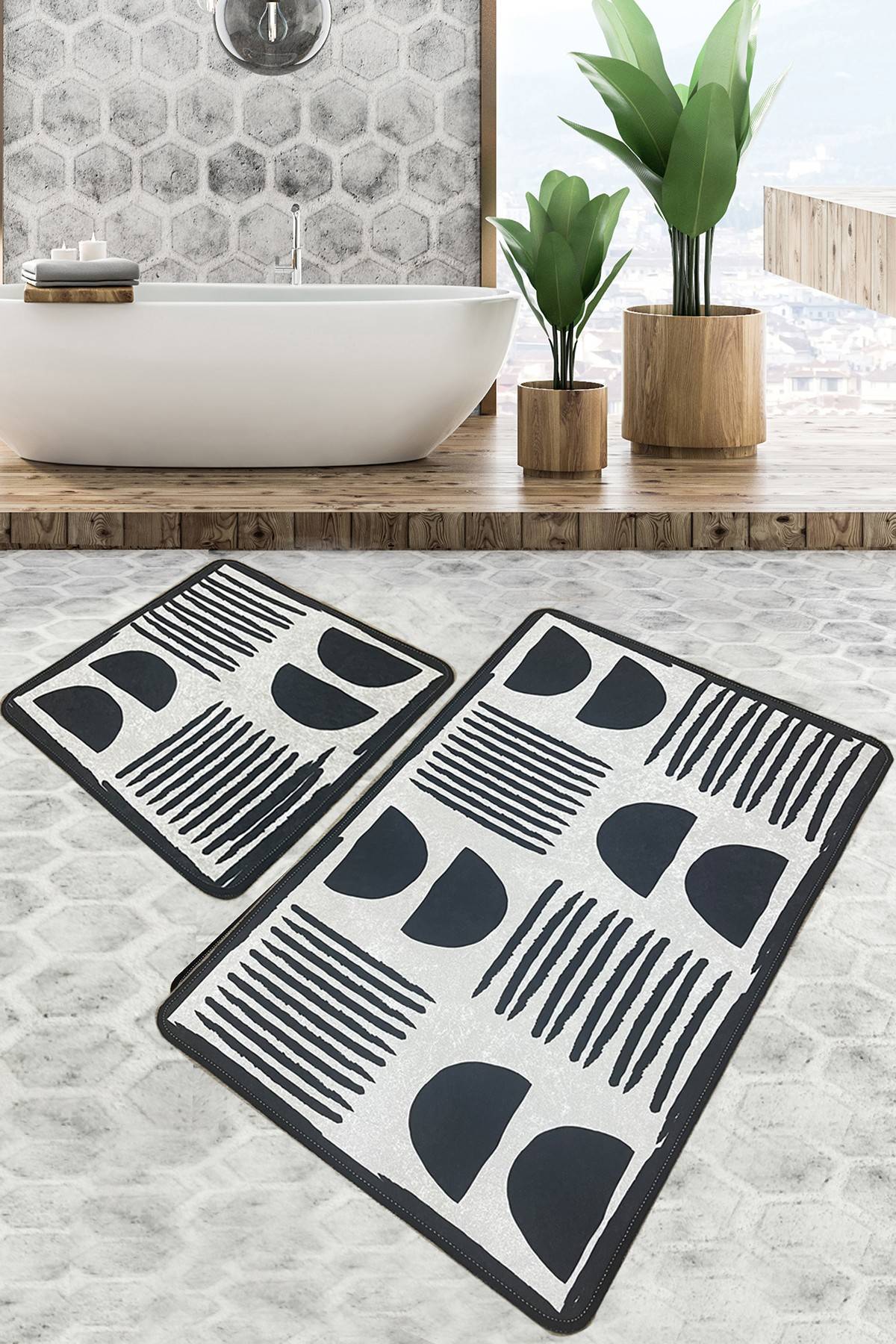 Set di 2 tappetini da bagno Budi con motivo etnico bianco e nero
