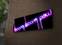 Tableau décoratif lumineux LED Lucendia 90cm Motif Boom Noir et Violet
